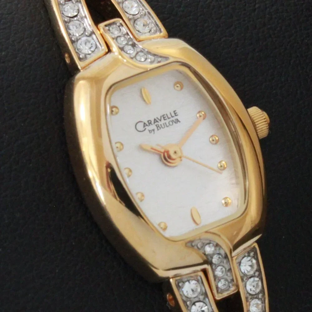 Caravelle Ladies Gold Tone Quartz Watch, MOP Dial, ½ Bangle Bracelet 16mm